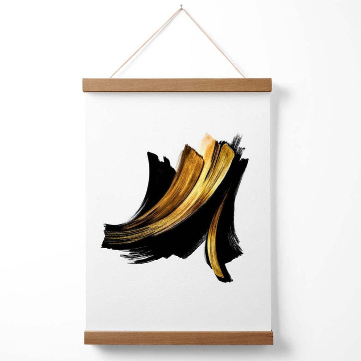 Abstrakt plakat med penselstrøkmønster i svart og gull, inkludert oppheng.