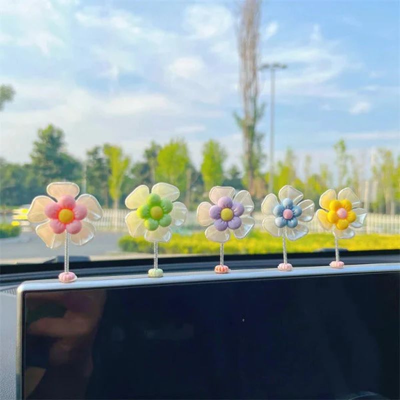 Skanto | Blomsterornamenter i bilen