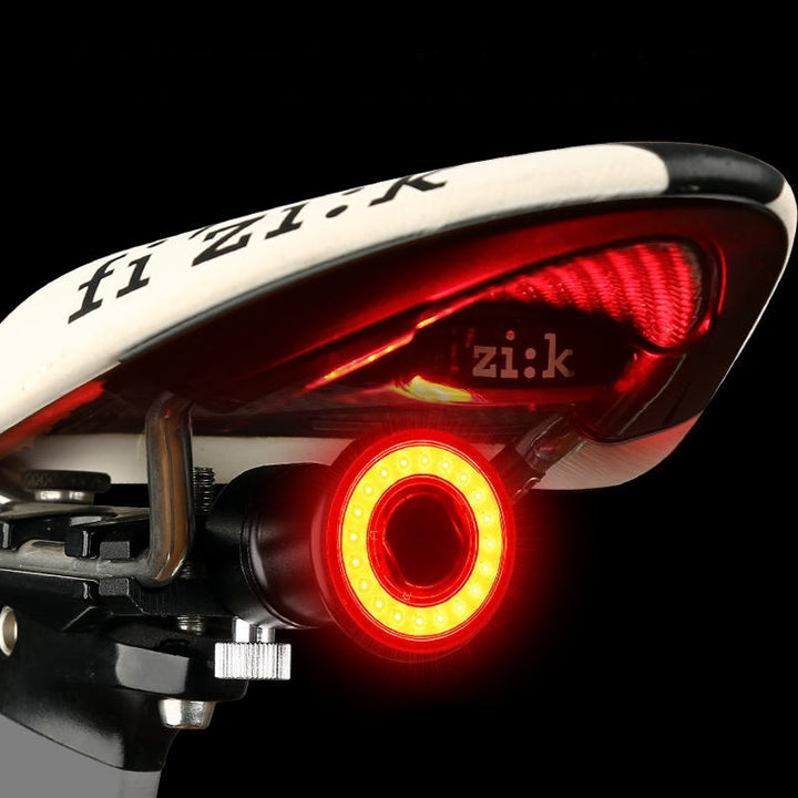 Skanto | VeloSafe Slim – USB-oppladbart intelligent sykkel baklys med bremsesensor