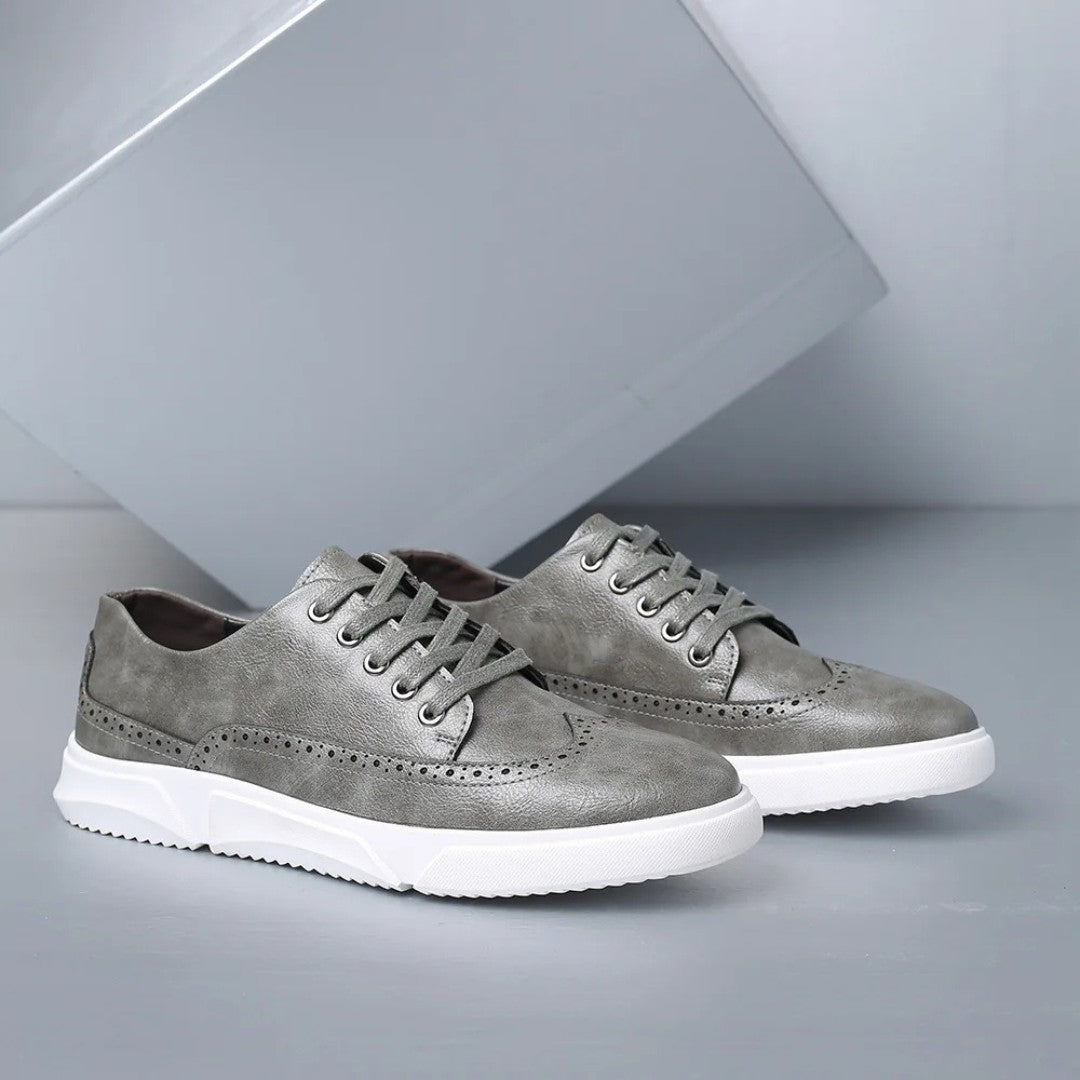 Brogue-sneakers i skinn med gummisåle