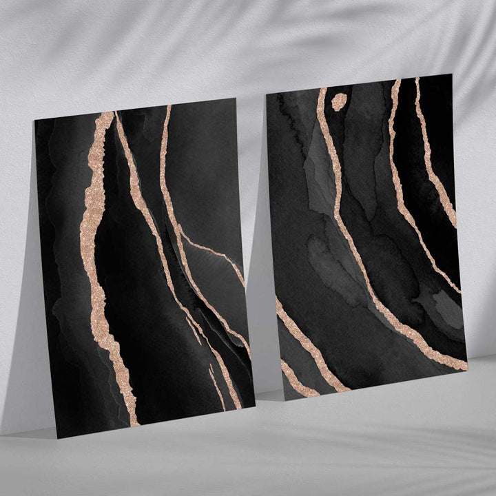 Abstrakt sett med 2 kunsttrykk i svart og gull