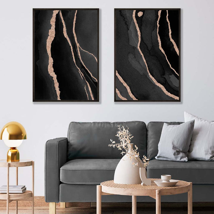 Abstrakt sett med 2 kunsttrykk i svart og gull