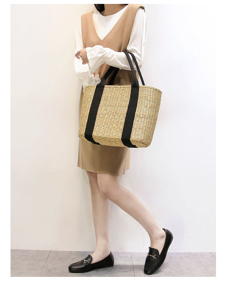 Spacious woven tote bag with comfortable, reinforced handles Skanto