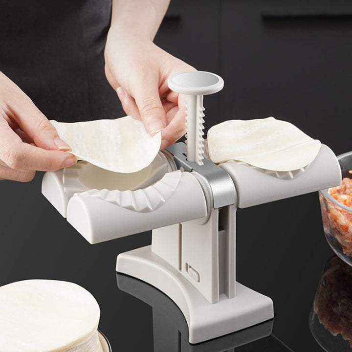 Skanto | Husholdningsdobbelhodet automatisk dumplingsformer mold