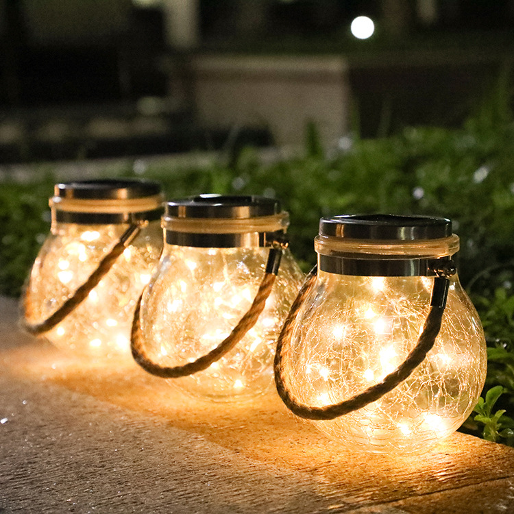 Skanto | Solenergi LED-lanterne i glass – Dekorativ hagebelysning med ledninger og bærehåndtak