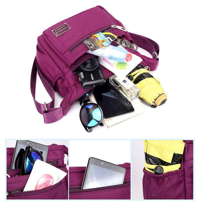 Skanto | Kvinners Multi-lags Nylon Crossbody Bag