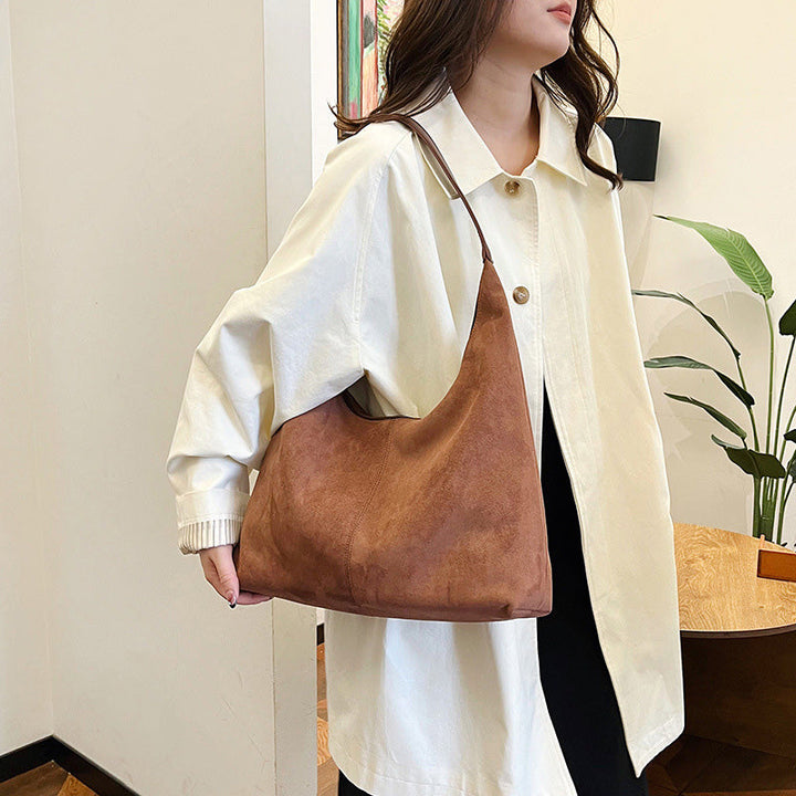 Skanto | Suede budveske med stor kapasitet