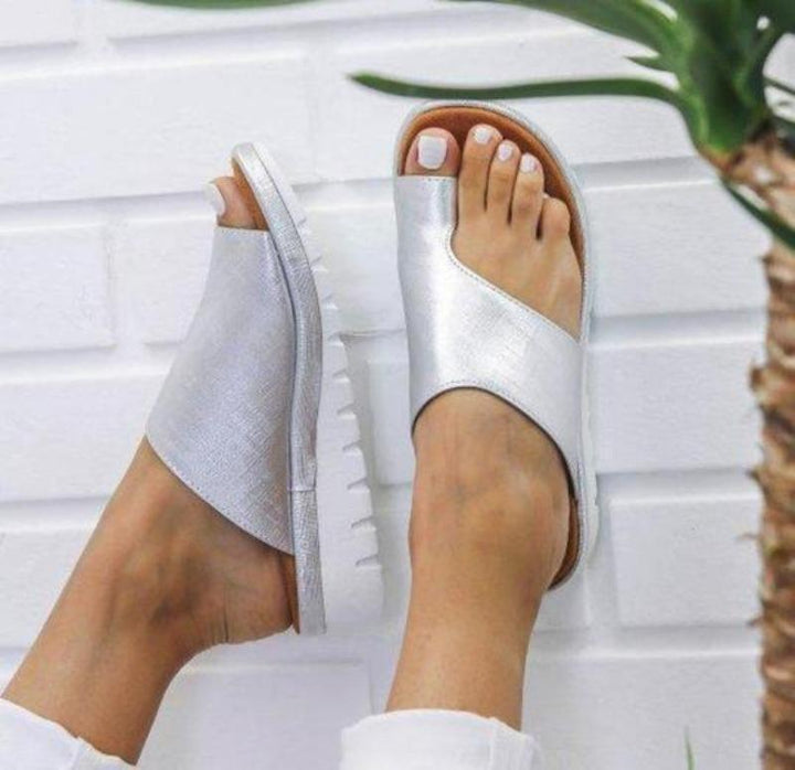 Ortopediske damesandaler, korrigering av hallux valgus