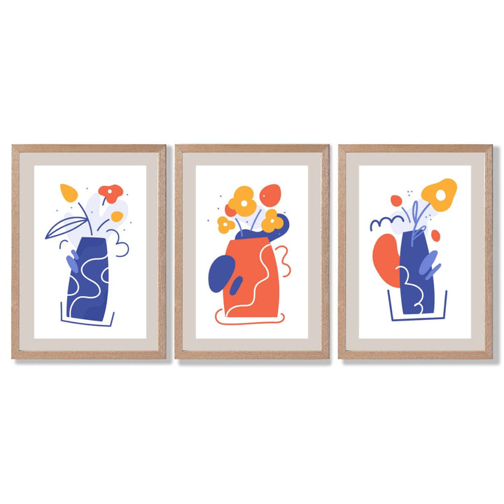 Bohemsk minimalistisk blomstertrykk i blått og oransje – sett med 3 innrammede kunsttrykk