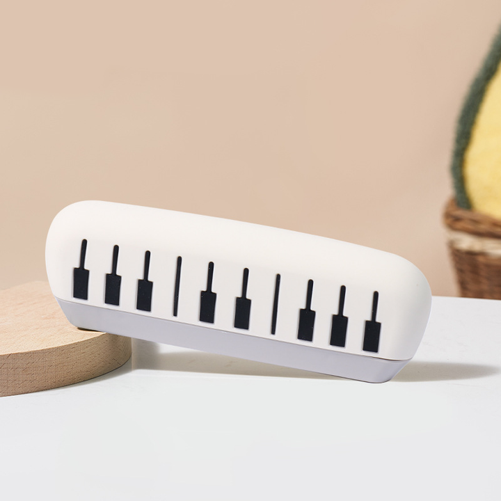 Skanto | 16-hulls tegneserieharmonika for barn