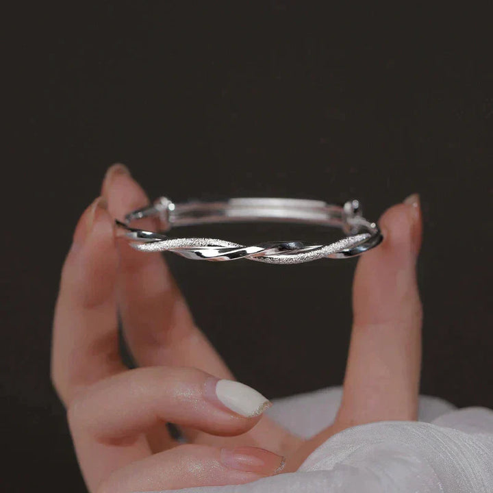 Elegant Vridde Sølv Armbånd Skanto
