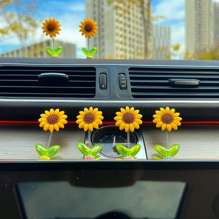 Skanto | Blomsterornamenter i bilen