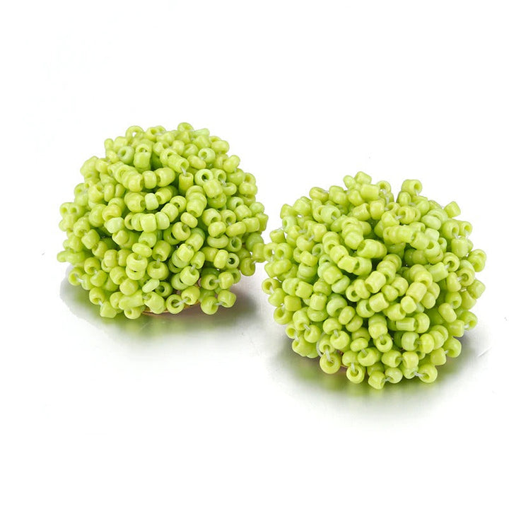 Skanto | Lys og morsom håndlaget multicolor perle pompom stud øredobber