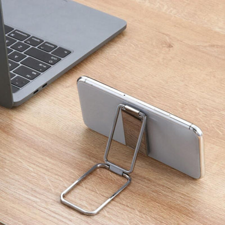 Ny sammenleggbar metalltelefonholder | Skanto