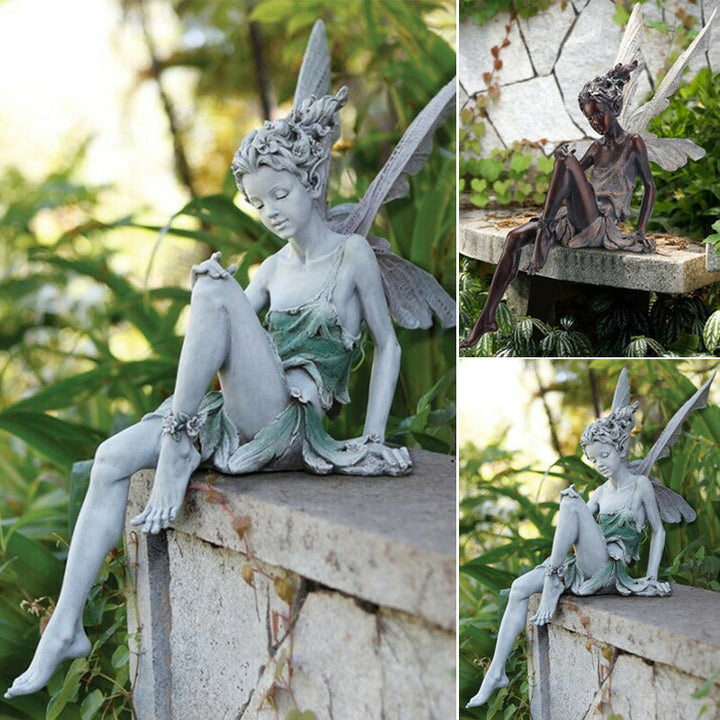 Skanto | Statue av sittende fe i hagen
