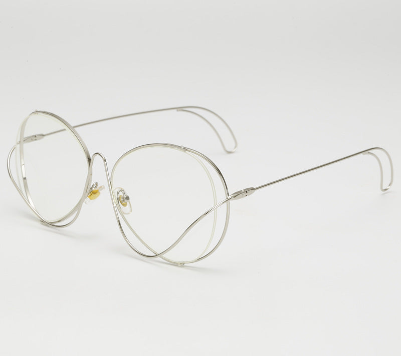 Dame moteriske halvrammebriller med filigran, minimalistisk design Skanto
