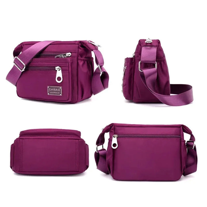 Skanto | Kvinners Multi-lags Nylon Crossbody Bag
