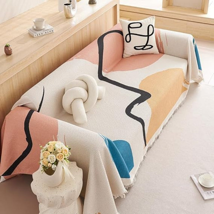 Skanto | Lumiere Abstract Tasseled Sofa Cover