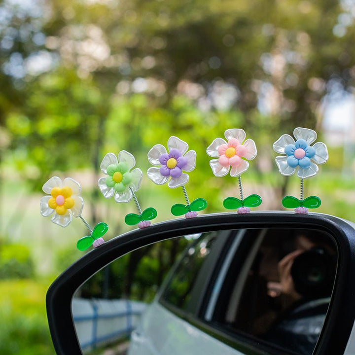 Skanto | Blomsterornamenter i bilen