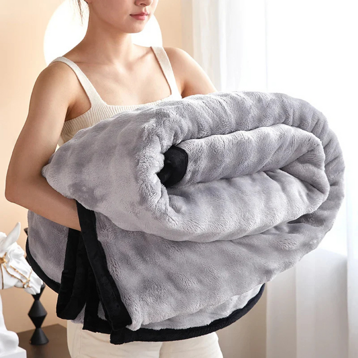 Skanto | Vendbar Fleece Teppe for Varme og Komfort