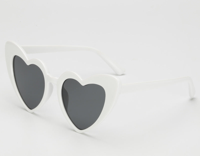Dame hjerteformede solbriller i trendy design Skanto
