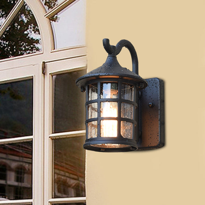 Seedet Glass Lantern Vegglampe Landsby Enkelt Lys Utendørs Vegglampe i Bronse/Svart | Skanto