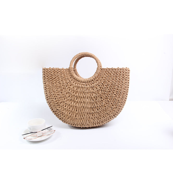 Generous basket bag with charming round handle Skanto