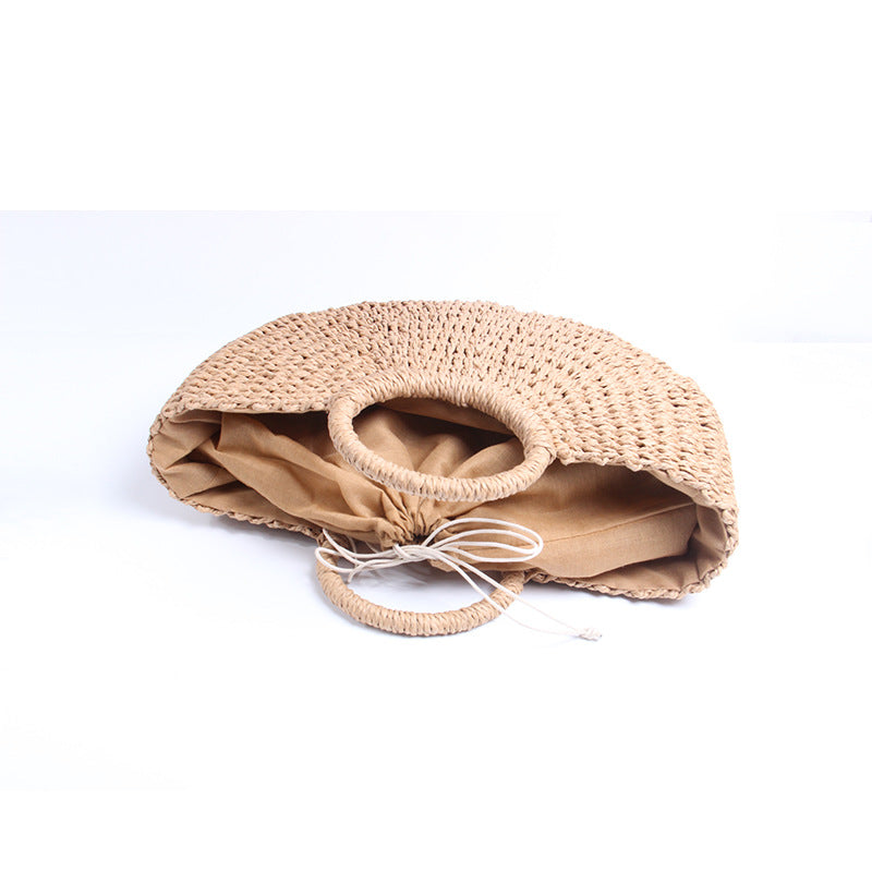Generous basket bag with charming round handle Skanto