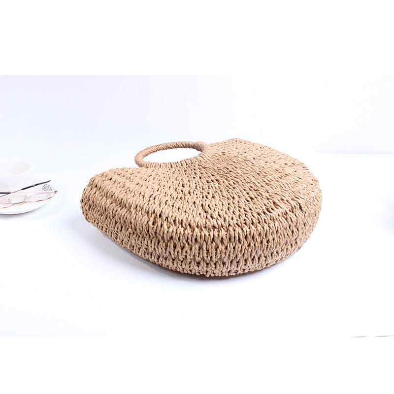 Generous basket bag with charming round handle Skanto