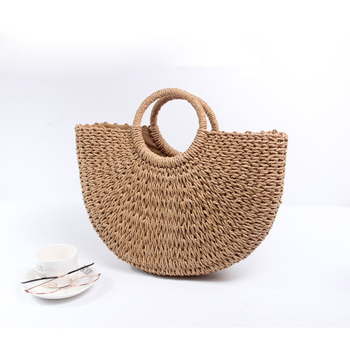 Generous basket bag with charming round handle Skanto