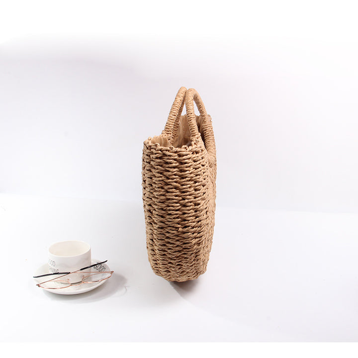 Generous basket bag with charming round handle Skanto