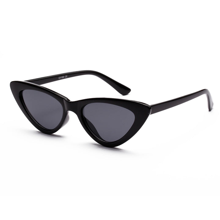 Dame Cat-Eye solbriller med transparent rammestruktur og gule glass Skanto