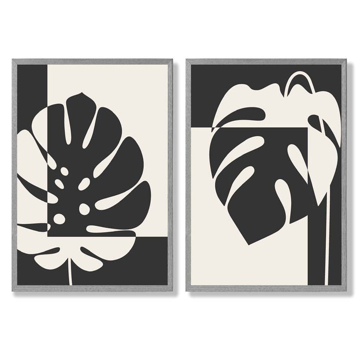 Sett med 2 innrammede kunsttrykk med Monstera-motiver i svart og beige