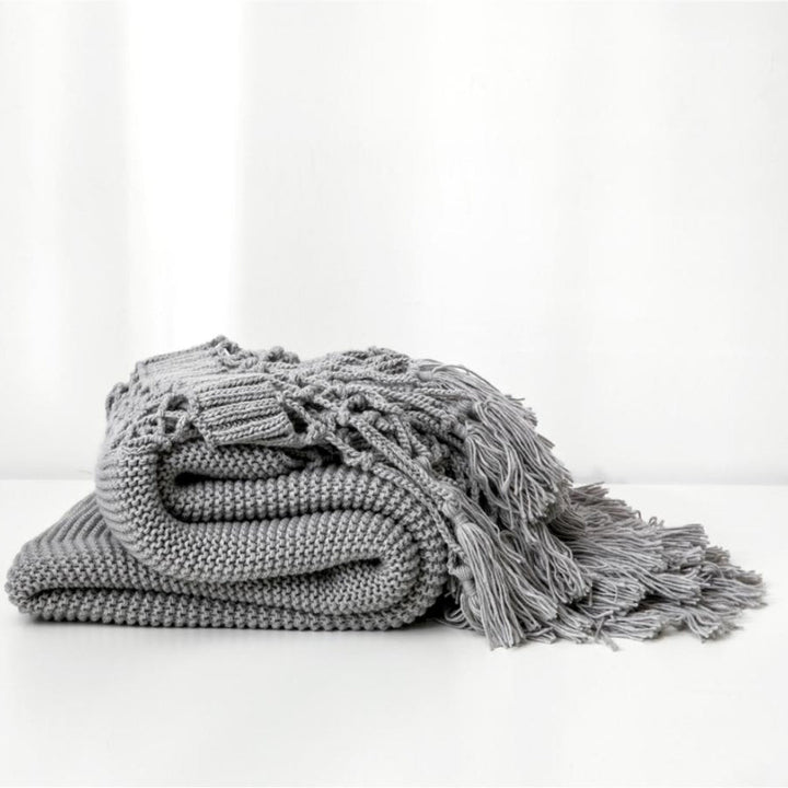Skanto | Snug Knit Woven Tassel Blanket