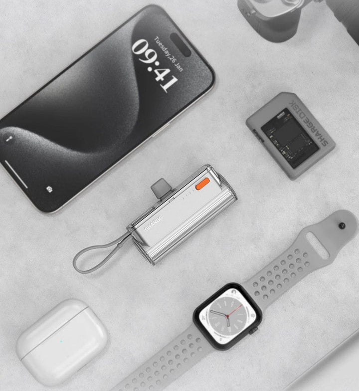 Skanto | 5000mAh Mini Kapsel Med Innebygd Kabel Power Bank