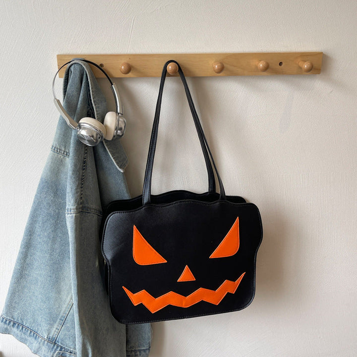 Skanto | Halloween Messenger Bag – Skulderveske i svart og oransje skummelt stil