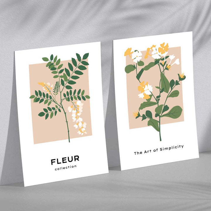 Sett med 2 kunsttrykk med beige og grønne villblomstmotiver i rammer