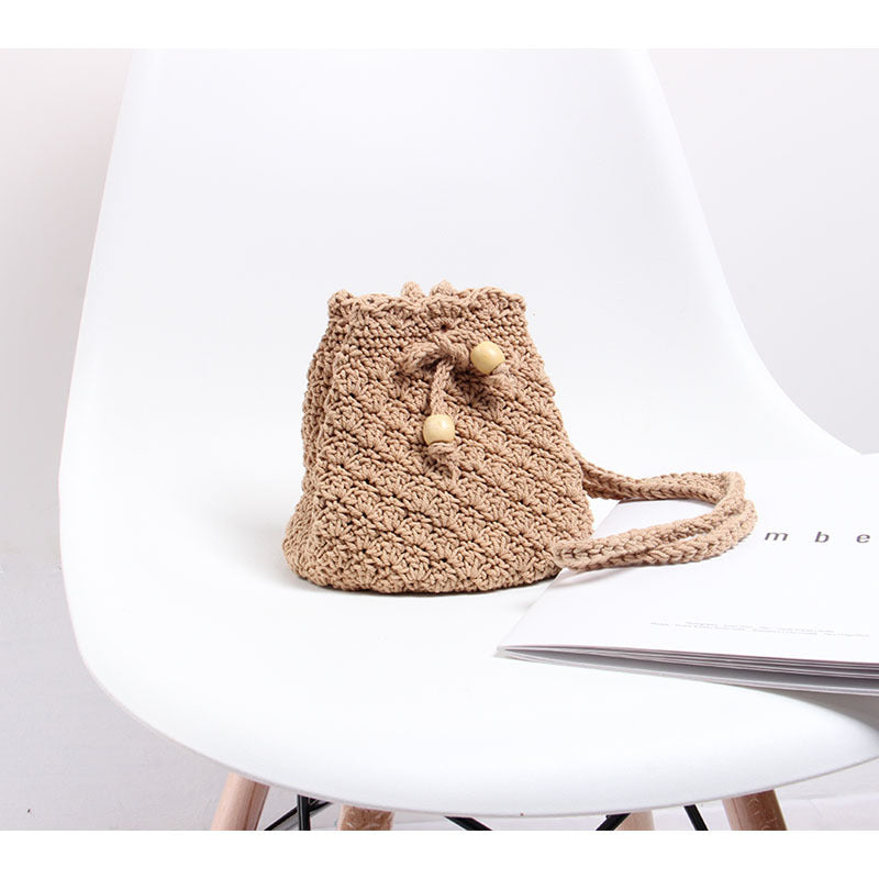 Hand-knotted shoulder bag in modern boho style Skanto