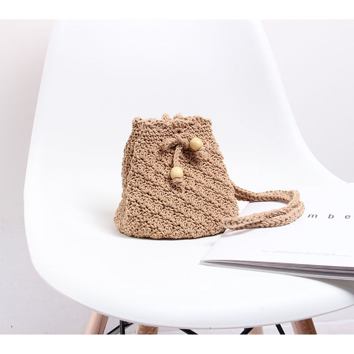 Hand-knotted shoulder bag in modern boho style Skanto