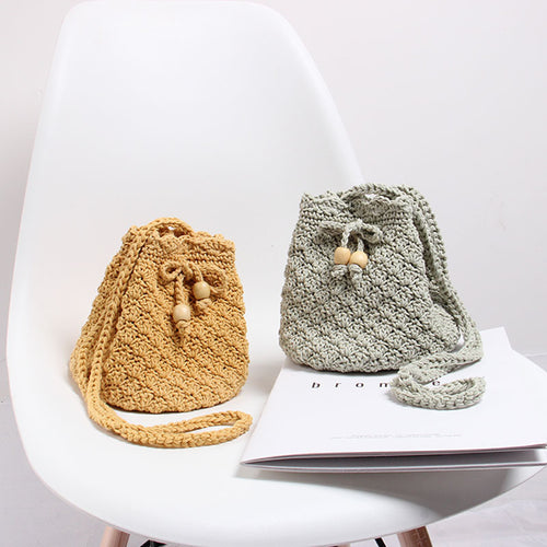 Hand-knotted shoulder bag in modern boho style Skanto