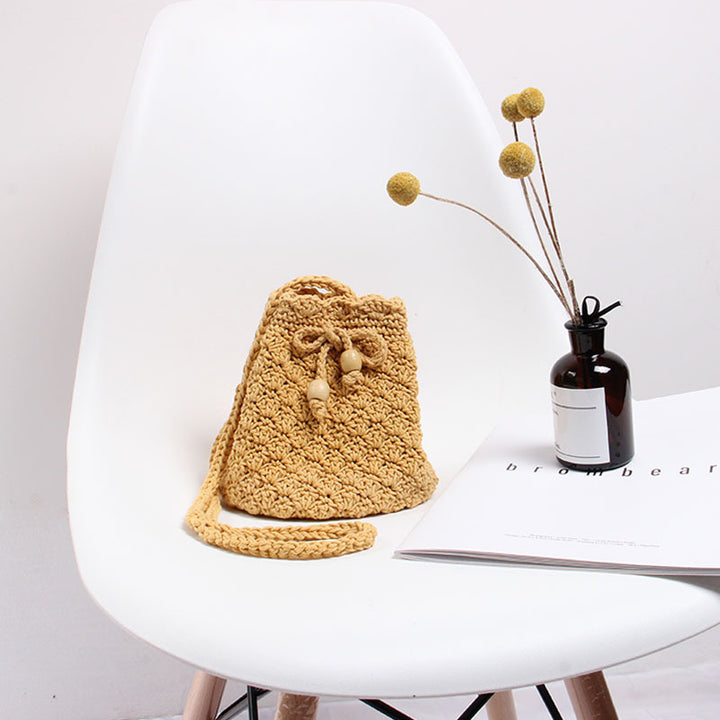 Hand-knotted shoulder bag in modern boho style Skanto