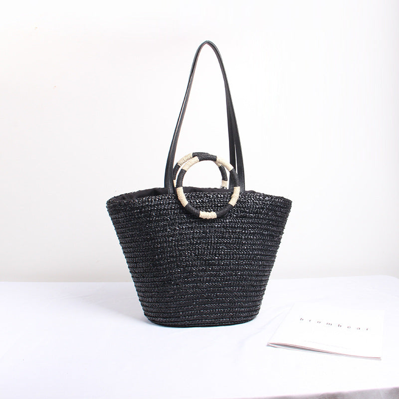 Designer Straw Bag with Playful Text and Decorative Pom Pom Skanto