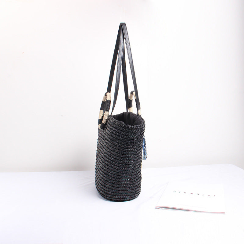 Designer Straw Bag with Playful Text and Decorative Pom Pom Skanto