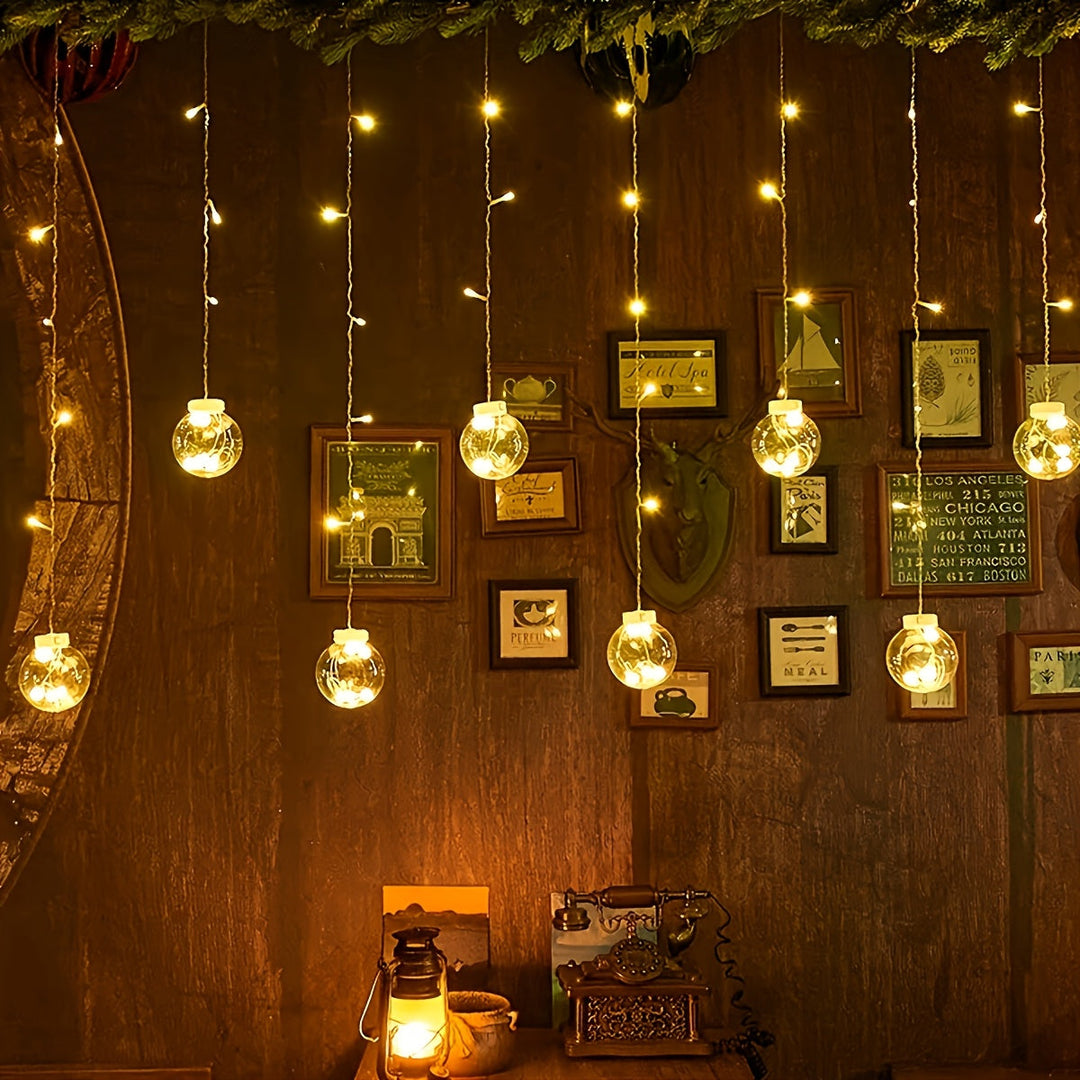 Skanto | Eventyrlys med hengende globusornamenter