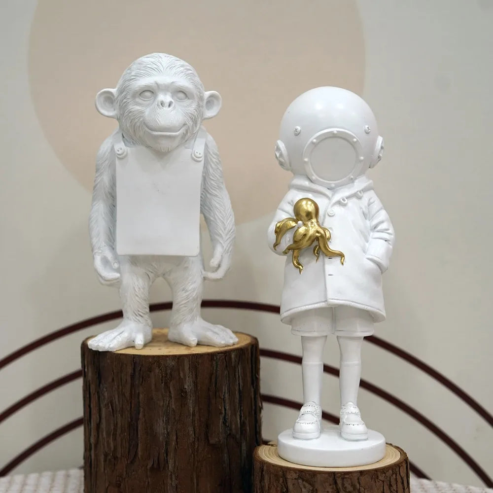 Skanto | Artify Banksy skulpturkolleksjon | Blomsterkaster & ballongjente | Popkunstfigurer | Moderne kontor- og hjemmeinnredning