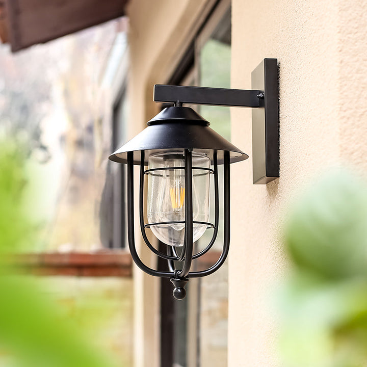 Moderne industriell jern- og glasskapslet sylinder 1-lys vegglampe for utendørs terrasse | Skanto