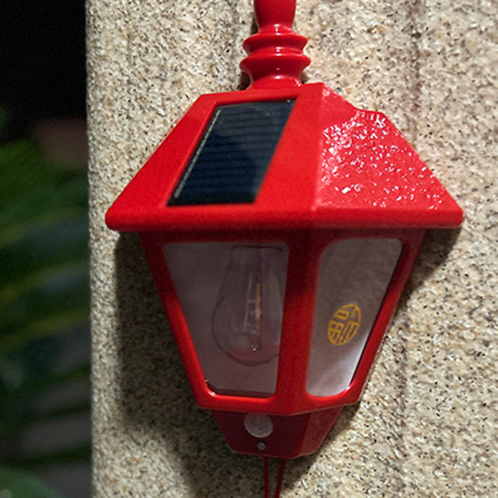 ABS Iron Fu-karakterkjegleformet solcelledrevet vegglampe med 1 lys for utendørs bruk