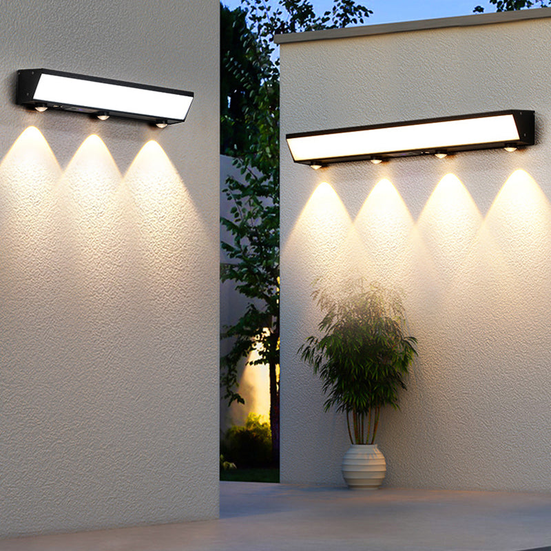 Moderne minimalistiske solenergi vanntett bevegelsessensor akryl aluminium og rustfritt stål rektangulær LED vegglampe for utendørs patio | Skanto