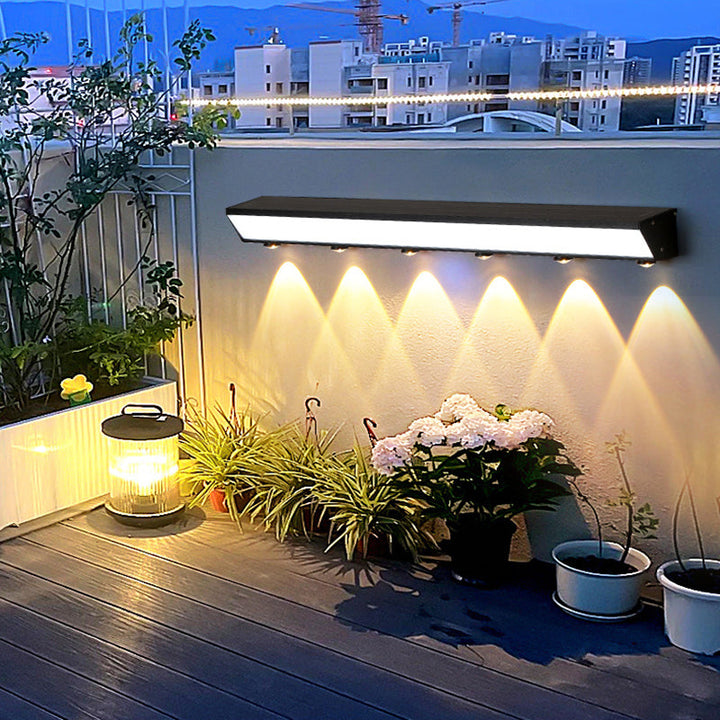 Moderne minimalistiske solenergi vanntett bevegelsessensor akryl aluminium og rustfritt stål rektangulær LED vegglampe for utendørs patio | Skanto