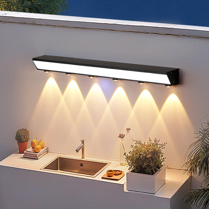 Moderne minimalistiske solenergi vanntett bevegelsessensor akryl aluminium og rustfritt stål rektangulær LED vegglampe for utendørs patio | Skanto